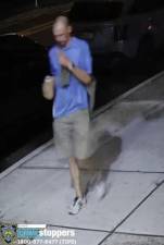 Police say this is a photo of an arsonist walking on Grand St. on July 6.