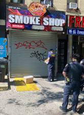 Sam’s Smoke Shop at 1777 1st Avenue gets the padlock treatment.