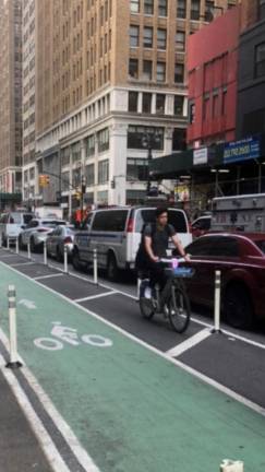 Bikers frequently go the wrong way down bike lanes and one-way streets. The writer was hit from behind by a wrong-way biker on Sixth Avenue recently. Cops would not take down an incident report, she said.