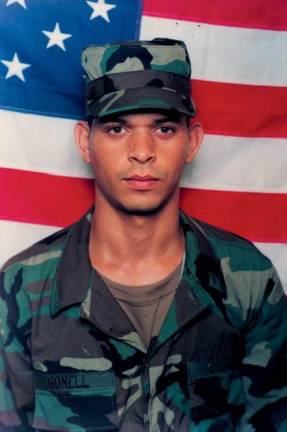 Two days before his 21st birthday, Aquilino Gonell enlisyed in the US Army. The photo is used as the book jacket cover art for his memoir “<i>American Shield” </i>co-authored with Susan Shapiro. The paperback edition hits on Veterans Day.