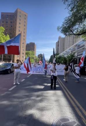 Marchers in the first ever LES Puerto Rican Day parade and festival. Photo: Stella Zhong