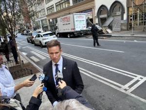 Eric Bottcher addresses reporters on Nov. 18 after a scaffolding collapse in on W. 29th St. injured three people. He was not aware at that time that a knife wielding maniac had already started a deadly spree that morning in Chelsea which would eventually claim three lives across Manhattan.