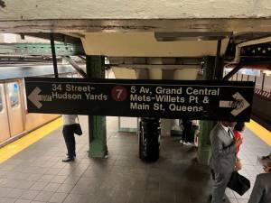 A suspect has been arrested in connection with an early morning attack on the “7” train platform in Times Sq. on July 10.A suspect in an attack on the A, C and E train platform less than five hours earlier on July9 remains at large.