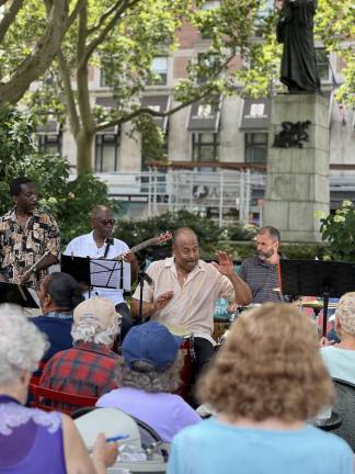 Steve Kroon performing at Dante Park