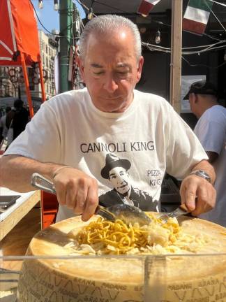 John DeLutro is hard at work during this year’s San Gennaro Festival.