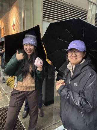 Sue (left) and Bin Bin are from China studying at NYU and enjoyed their first ever Thanksgiving Day parade.