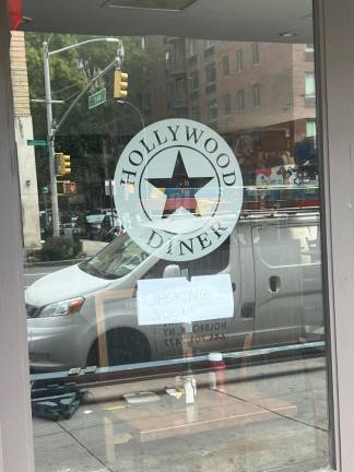 The Hollywood Diner is alerting the public with a sign in its windown that it plans to reopen soon, after a two-alarm fire broke out at the Chelsea restaurant on August 28.