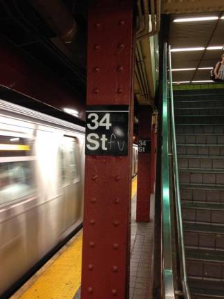 Waiting for the F train at 34th Street