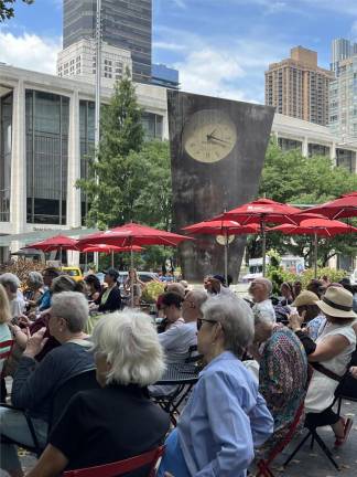 Upper West Siders amusing themselves with some Latin Jazz at Dante Park on July 10th.