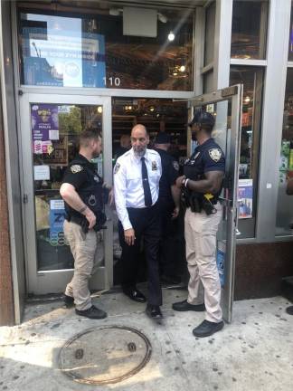 Sheriff Anthony Miranda leaves an illegal smoke shop at 110 Center St. after it was raided by the joint task force in May at the start of the crackdown now in its third month.