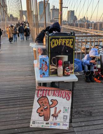 Dozens of Illegal Vendors— &amp; One Giant Ape—Reclaim Brooklyn Bridge from City