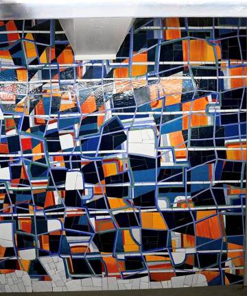 Artist Lisa Corinne Davis, is both a graduate and a professor of art at Hunter College. This artwork appears on three panels in the newly renovated E. 68th Station.