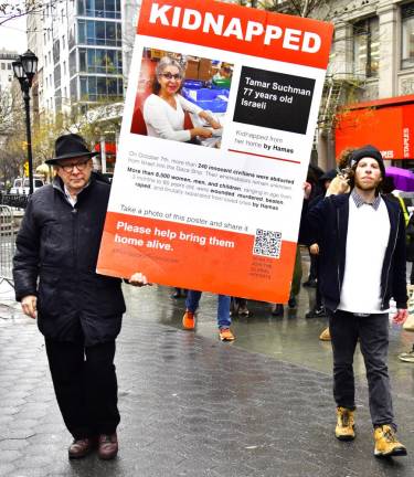 Protestors march each week across downtown calling for the hostages who are still believed to be alive, including 77 year old Tamar Suchman, to be released safely.