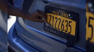 <b>Ghost plates are a moniker for fake or obstructed license plates, which are often linked to vehicles involved in more severe crimes. Pictured is a license plate the driver attempted to cover with what looks like paper or stickers. </b>