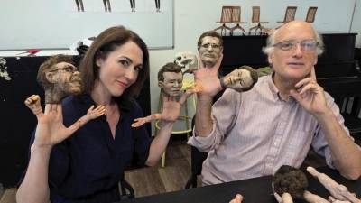 Kelley Curran (left) and Frank Wood uses finger puppets to represent the characters from Trump’s inner circle who huddled in Trump Tower in June 2016 with a Russian lawyer who was promising to hand over incriminating info on Hillary Clinton.