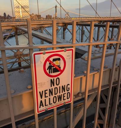 Dozens of Illegal Vendors— &amp; One Giant Ape—Reclaim Brooklyn Bridge from City