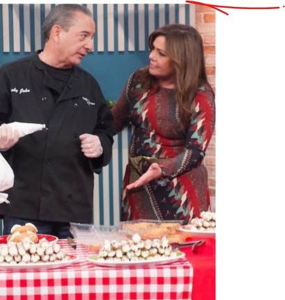 Rachael Ray journeyed to Little Italy to visit John DeLutro at Cafe Palermo to find out how he made his cannolis.