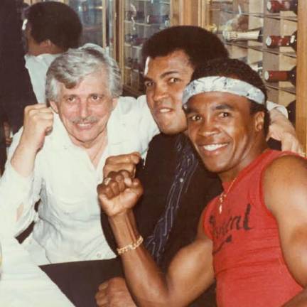 Among the celebrities who popped by over the years were boxers Sugar Ray Leonard (right) and Mohammed Ali (center), striking a pose with founder Victor Del Corral