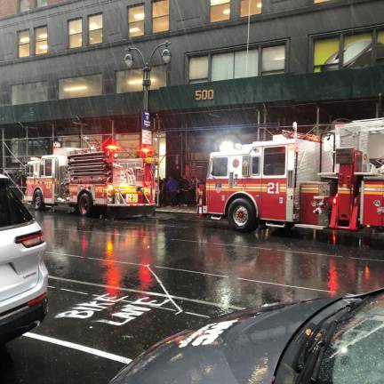 Smoke in the basement of 500 Eighth Ave. forced the evacuation of the office building. Photo: Keith J. Kelly