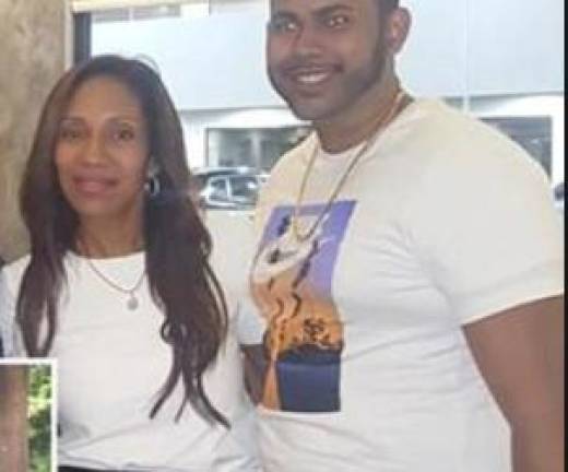 Vianel Garcia (left) in an undated photo with her son Miguel Duval who is accused of pushing her down a hill and clubbing her to unconsciousness. She was pronounced dead at Harlem hospital and her son was arrested in connection with the incident. Photo: Facebook