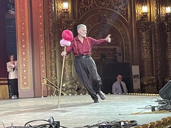 Second-place winner David Husney dances with a mannequin to the song “Power.”