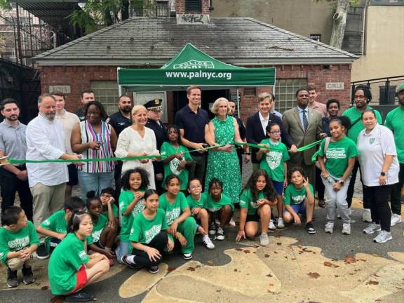 Special Narcotics Prosecutor Bridget Brennan, City Council Member Erik Bottcher, State Senator Brad Hoylman-Sigal (center) at a July 25 ribbon-cutting at McCaffrey Playground. Bottcher said that he’d secured $350,000 for the playground in the city budget.