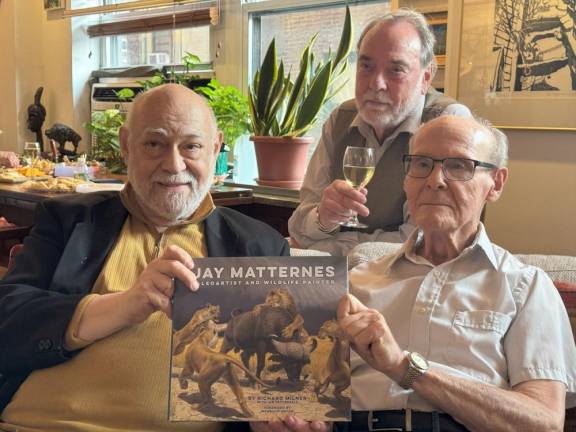 Jay Matternes (far right) with his co-authors at book launch party on UWS.