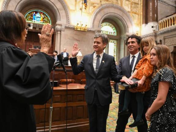 Senator Brad Hoylman-Sigal (center) has been pushing for tighter regulations governing tour bus operators for at least six years. Photo: NYS Senate Office of Hoylman-Sigal