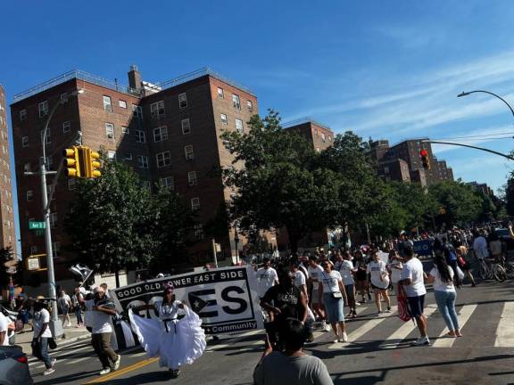 Marchers head up Ave D in the first ever LES Puerto Rican Day parade and festival on June 1. Photo: Stella Zhong