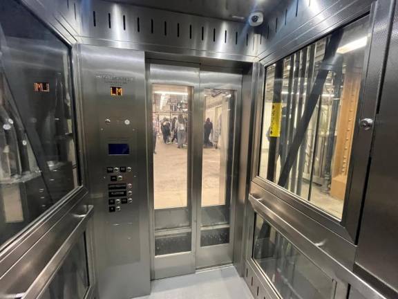 Inside the brand-new elevator on the 6th Avenue L train platform, which enables step-free access to the passageway to the 1,2, and 3 trains at 7th Avenue. No longer will the mobility challenged be daunted by steps with this transfer.