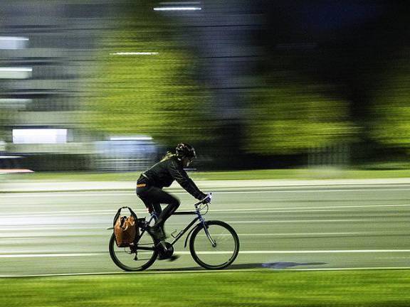 When biking at night, lights should be mandatory. Photo: Sascha Kohlmann, Wikimedia Commons