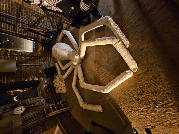 A closeup of “Zohra the Spider” (create d by puppeteer Basil Twist) before her annual descent from the Jefferson Market Library clocktower on Halloween night.