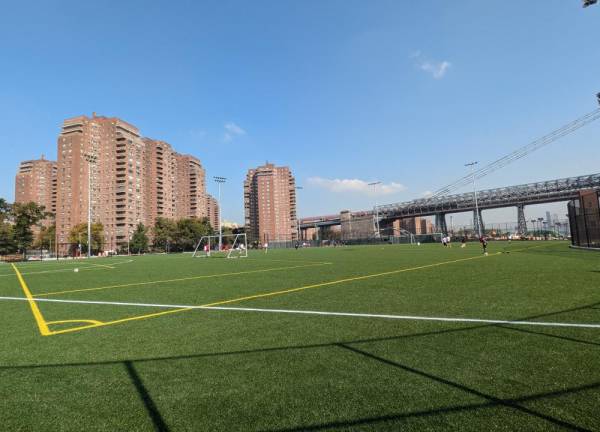 Ballfields 1 and 2 in John V. Lindsay East River Park. Towers at left are part of the cooperative East River Housing Corporation.