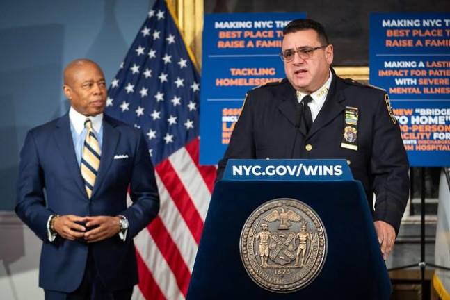 Chief of Transit Joseph Gulotta appears at a City Hall press conference with Mayor Eric to detail how the NYPD planned to put two cops on every night time subway train for the next six months between 9 p.m. and 5 a.m. each day.