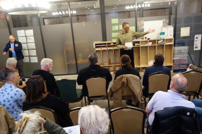 Jesenko Vukadinovic, president of the Chelsea West 200 Block Association kicks off the semi-annual meeting that drew a host of elected officials who heard that crime and public safety are the biggest issues on the minds of neighborhood residents.