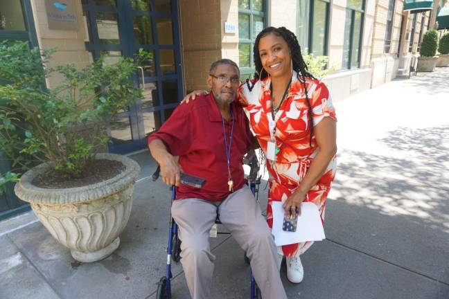 Janicia Hyde, Vista on 5th’s Life Enrichment Supervisor, with a resident