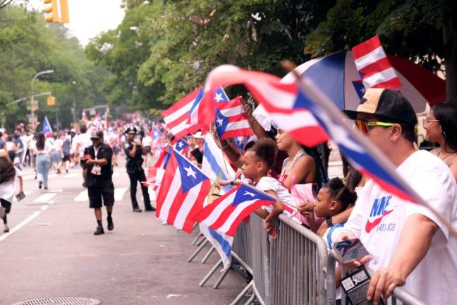 It was a day to show off the colors as thousands lined Fifth Avenue for the annual Puerto Rican Day Parade on June 11. Photo: Beau Matic