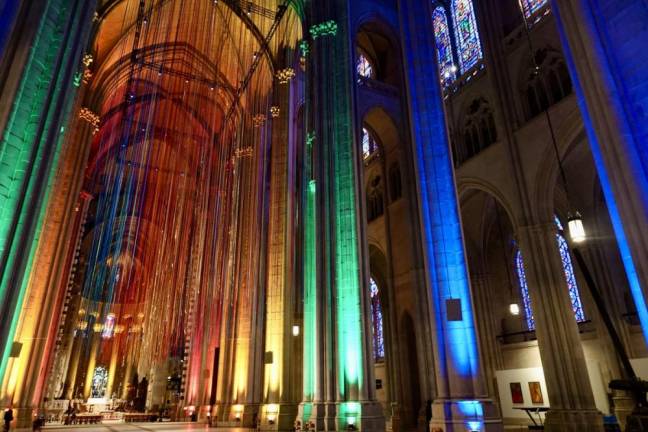 <b>The Cathedral Church of Saint John the Divine lit up in rainbow lights to kick off Pride Month 2024.</b>