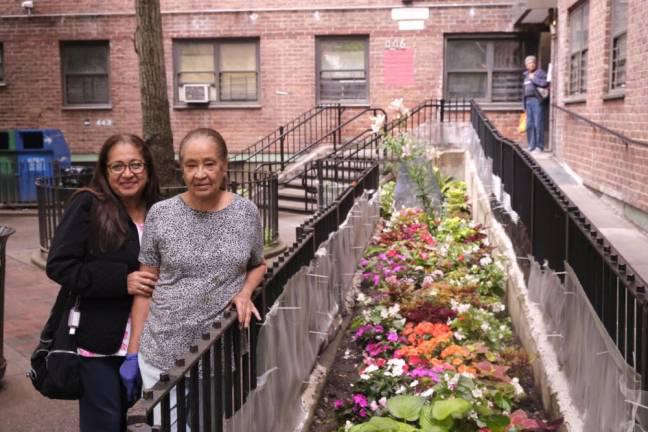 Delfensa Plasencea and Maria Moneira, residents of the Fulton &amp; Chelsea-Elliot Houses, in front of their apartment. They said they were duped by a NYCHA survey asking about a now-approved demolition plan.