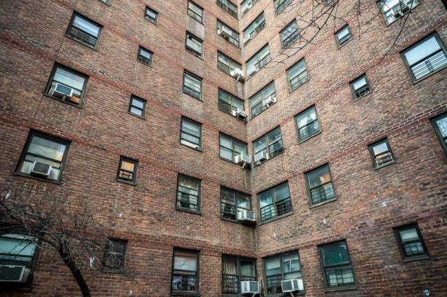 The city says it will be cheaper to knock down the run down Chelsea-Elliott Houses and its sister NYCHA project, the Chelsea-Fulton Houses, than it would be to repair the aging buildings.