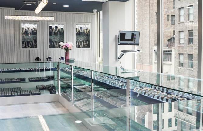 The family business started in the watch business with three stores on Canal St in the early 90s, and expanded into engagement rings in their current home in the Diamond District. Their showroom is pictured above.