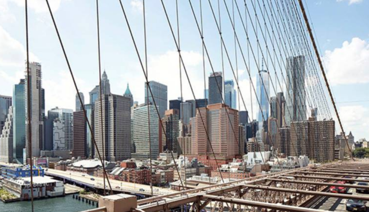 The projected view of the Howard Hughes Corp.’s planned South Street Seaport development from the Brooklyn Bridge. The developer won a court battle over the project on May 21.