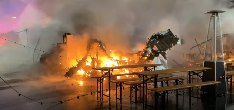 An early-morning fire engulfing the Herald Sq. holiday market on Dec. 16. On Dec. 27, another fire tore through the Bryant Park holiday market. Both spaces are overseen by Urbanspace Markets.