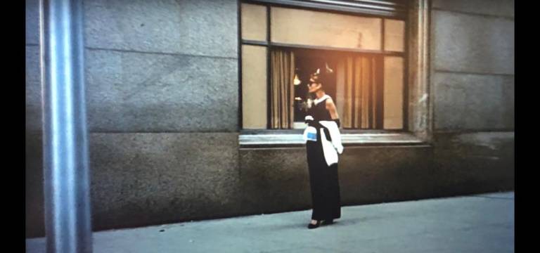 Ms. Hepburn walks away from the Tiffany’s window on Fifth Avenue.