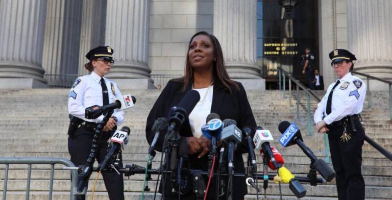 Letitia James speaking on the courthouse steps in June after the conviction on 34 counts of business fraud of Donald J. Trump, who was ordered to pay $463.9 million in damages. The case is on appeal by president-elect Trump.