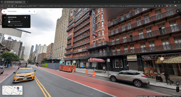 A woman was tackled to the ground and robbed at knifepoint right outside the Hotel Chelsea.