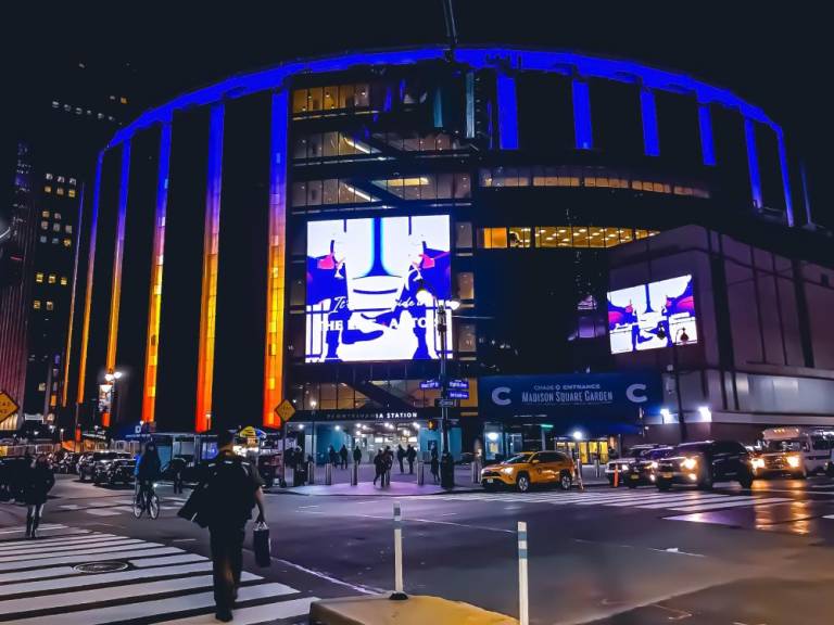 $!A night shot of the most famous arena, Madison Square Garden, exterior illuminated, where sporting events takes place. Commuters and cars traveling. 2/8/2021