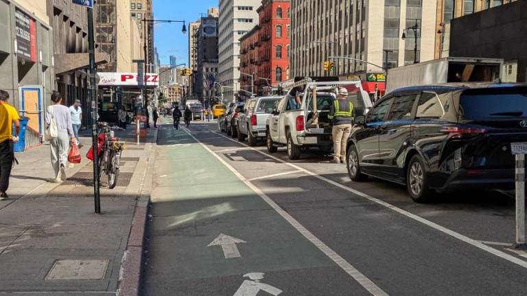 Church Street protected bike lane looking north towards Chambers Street. October 10, 2024.